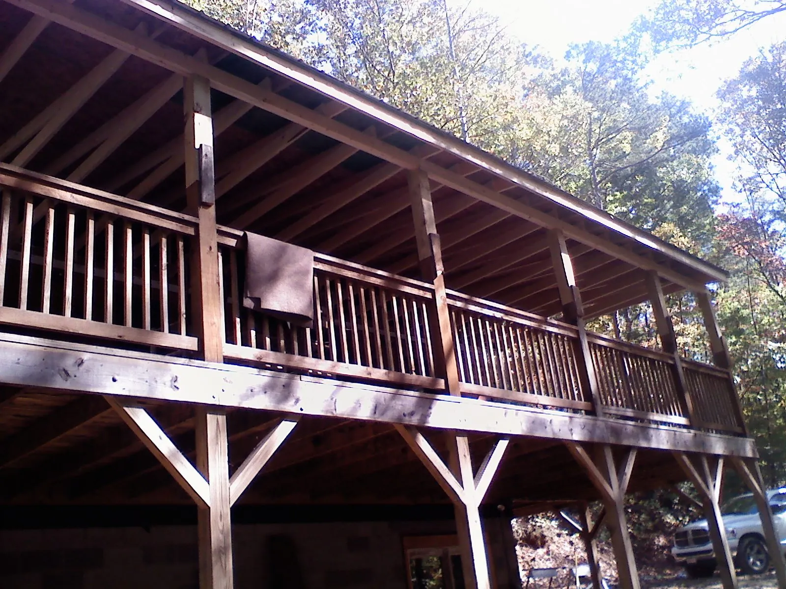 Timber framing under a new elevated porch and deck — Roof Leak Repair in Seguin by Roofing Brothers